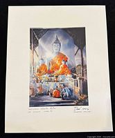 Front view of matted signed art print showing image, signature, title and date