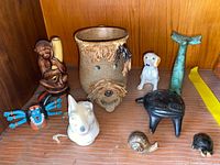 Group view of all decorative items on shelf