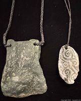Both pendants showing overall appearance and cords