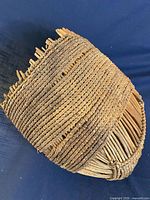 Full view of woven fish trap basket