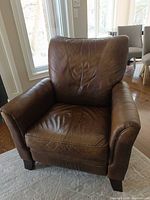 Front view of brown leather La-Z-Boy recliner