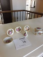 All six porcelain miniatures displayed together