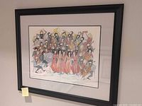 Full view of framed watercolour in black frame with mats