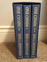 Spines of three volumes in slipcase showing titles and publisher