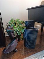 Group view of both Abbott vases, hammered planter with lid and faux ivy