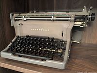 Front view of Underwood typewriter showing keys, carriage and branding