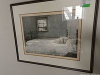 Full view of framed Andrew Wyeth print on wall