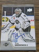 Front view of autographed Troy Grosenick Upper Deck card in sleeve