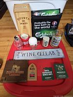 Overall view of all bar collectibles on red surface