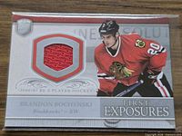 Front of Brandon Bochenski 2006-07 Upper Deck Be A Player card showing red jersey swatch and player image