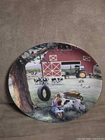 Front view of porcelain plate with farm scene artwork