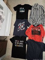 All six shirts laid out – overview of lot
