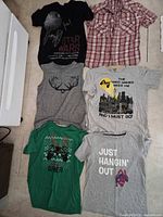 All six shirts laid out flat for overview