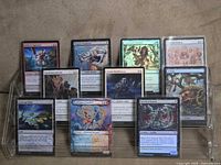 Full lot view showing all 11 sleeved foil cards