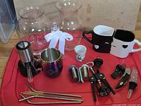 Full lot overview showing all barware, glass vases, mugs, tools and straws