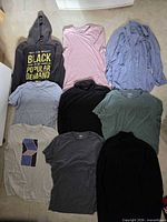All nine shirts laid out for overview