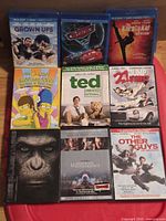 All nine movie cases laid out front cover visible