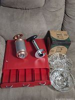Group shot showing organizer, cookie press, corer, boxed crock and both glass bowls