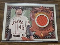 Front of card showing Lance McCullers Jr. image and orange jersey swatch