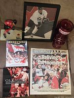 Group overview of all six memorabilia items on couch