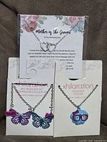Overview of all three packaged necklaces