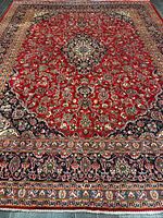 Full view of entire rug showing medallion and border