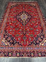 Full view of Kashan rug showing entire pattern and size