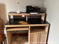 Overall view of desk with printer and lamp
