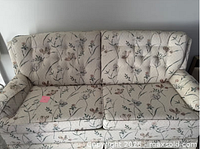 front view of the floral upholstered sofa