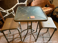 Table and two stools full view