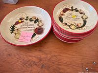 Large bowl and stacked medium bowls on table