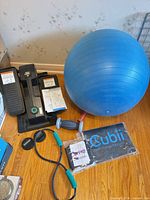 Cubii elliptical, yoga ball, manual, wheel stoppers, accessories