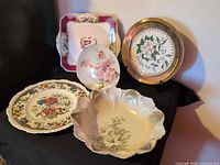 Group photo of RS Prussia bowl and five assorted floral plates