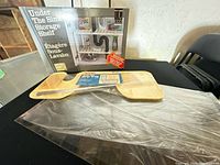 Boxed under-sink storage shelf, drip tray on top, plexiglass sheet underneath