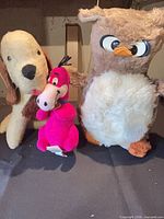 Group shot owl, puppy, Dino plush