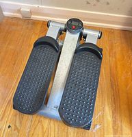 Top view of Sportline mini stepper showing two black textured pedals and silver frame
