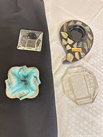Group shot of all four ashtrays