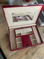 Jewelry box open showing mirror and compartment layout