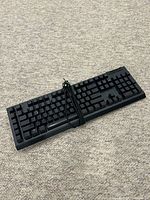 Top view of full Razer BlackWidow V4 X keyboard with braided cable
