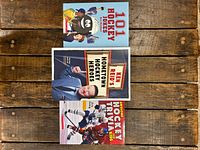 Front covers of three hockey books