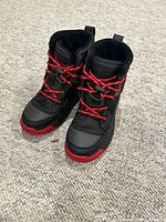 Pair of Sorel boots front view showing color and lacing