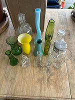 all 14 vases grouped on tabletop