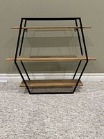 Front view showing full shelf unit and three tiers