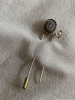 Both stick pins showing overall design and size