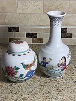 Ginger jar and vase front view showing decoration