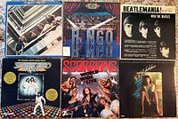 Front covers of all six albums displayed