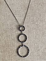 Full view of necklace hanging to show overall design and length