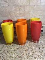 All six plastic tumblers standing upright showing colors