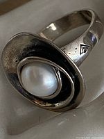 Front view showing pearl and spiral design