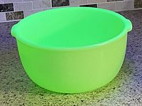 Bowl glowing bright green under UV light